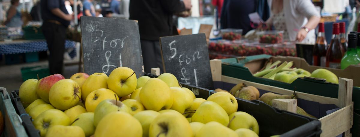 A picture of a fruit and veg stand at the Ashford market