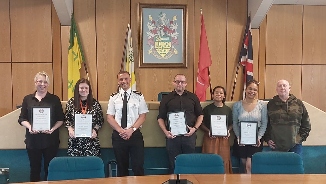 Image shows Inspector Richard Batten and representatives from The Ashford Club, Cameo, The County Hotel, Valerie’s and Ashford Truck Stop.