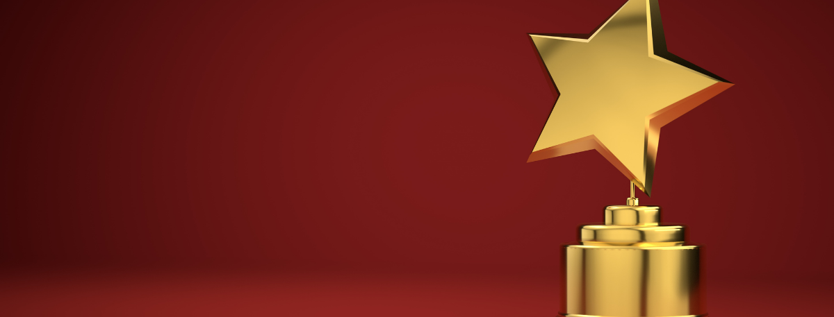 Gold award on a red background