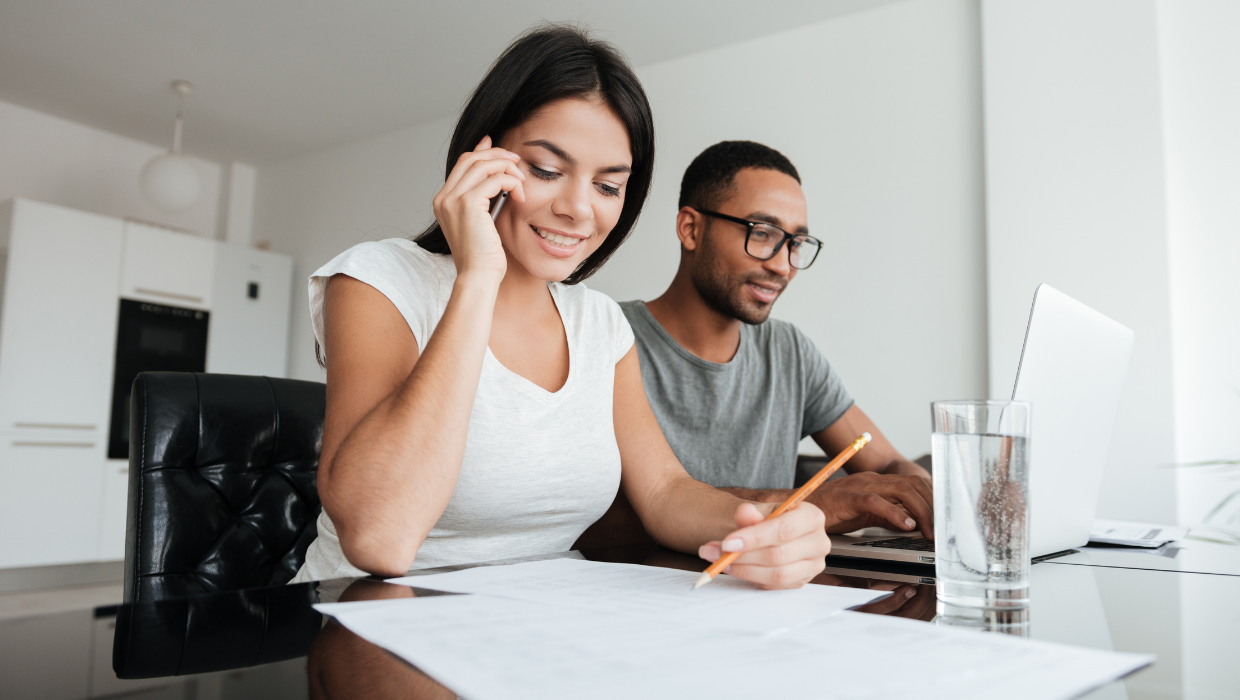 Happy couple receiving their business support grant