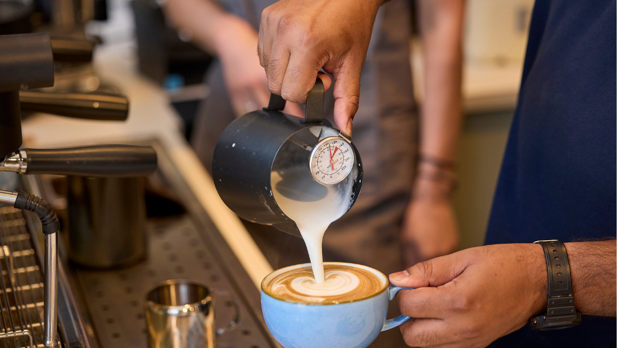 Someone making a coffee