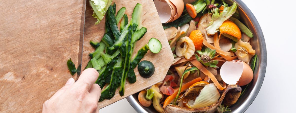 Food being scrapped in a food caddy