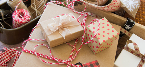 presents wrapped in brown paper and string
