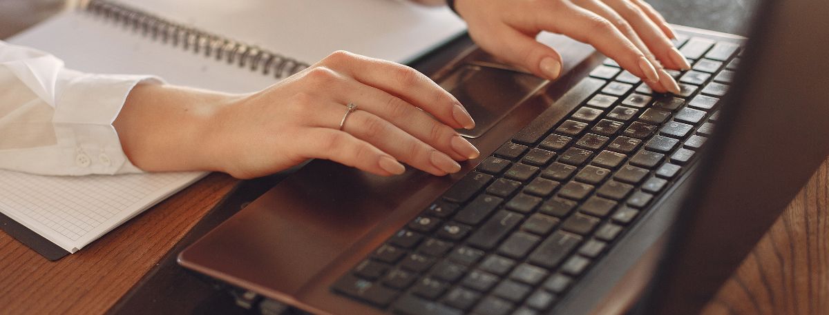 Person using a laptop to buy services online