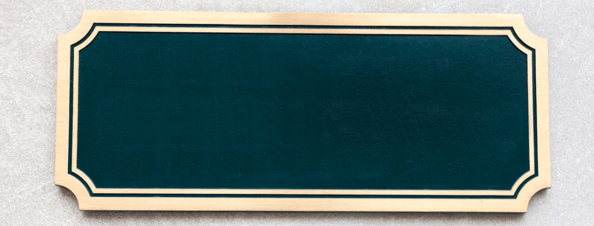 A blank green plaque