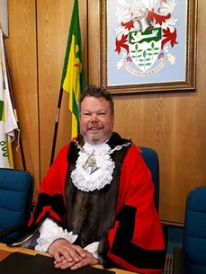 The Mayor of Ashford, Councillor Callum Knowles sat in the council chamber