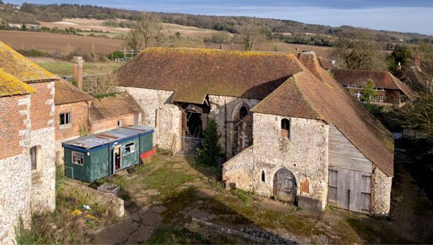 Historic England has funded urgent structural repairs to the vast Grade I listed 14th-century barn, built as the Great Hall of Charing Palace in Kent