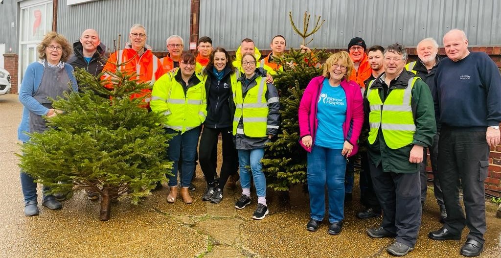 Photograph of Pilgrims Hospice Christmas tree recycling team
