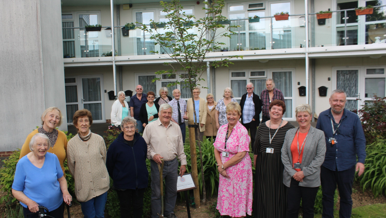 Residents of Luckley House planting a Coronation cherry blossom tree tile