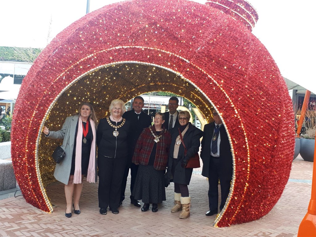 The Mayor visiting the Christmas bauble at the Designer outlet