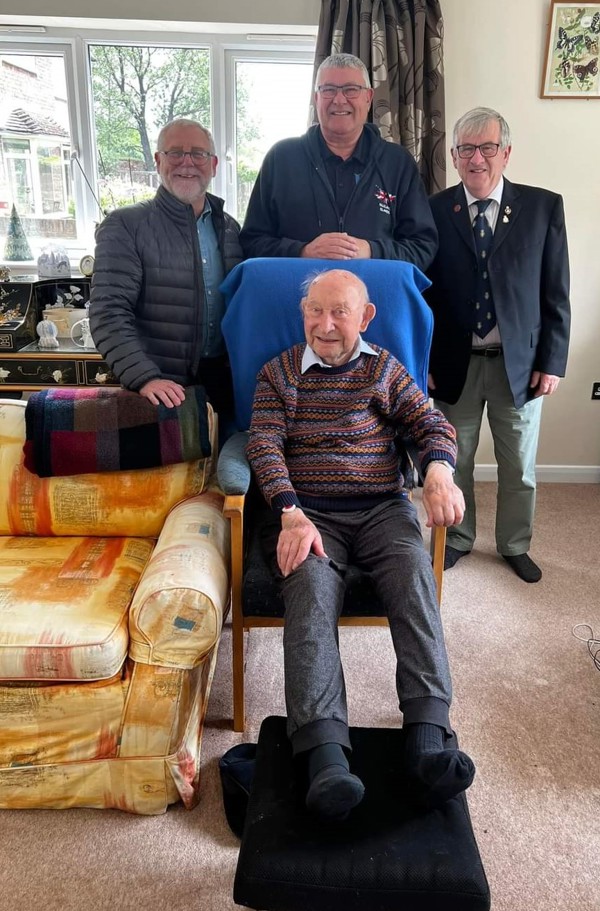 Stanely Elliss with members of the Royal British Legion Ashford Branch