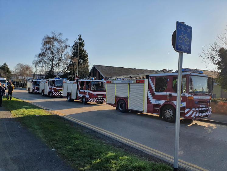 Convoy of fire engines on a road