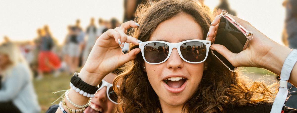 Young person having fun at a music festival