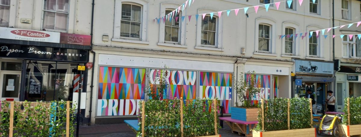 Image of Bank Street - bunting, tables and planters 