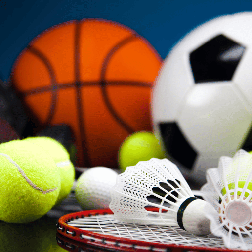 Image entitled Various sports equipment including a football, basketball, tennis ball and tennis racket.