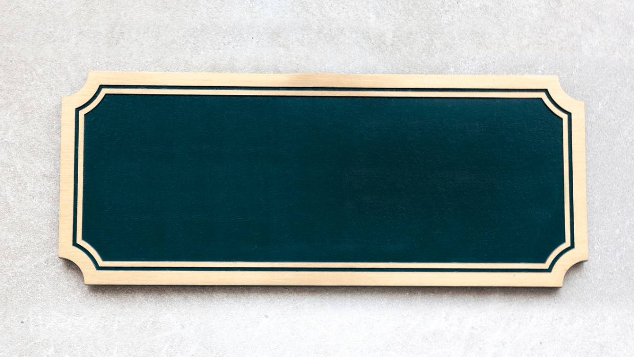 A blank green plaque