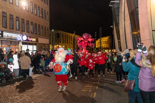 Father Christmas, TheatreTrain Ashford and Binbot travelling up bank street