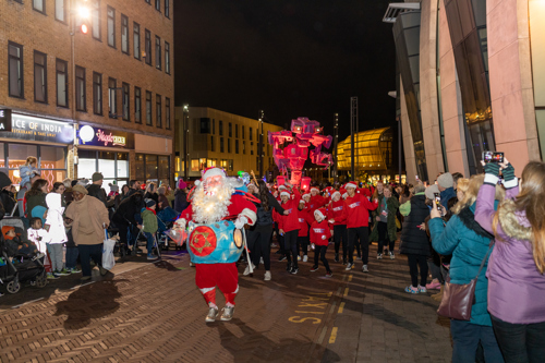 Father Christmas, TheatreTrain Ashford and Binbot travelling up bank street