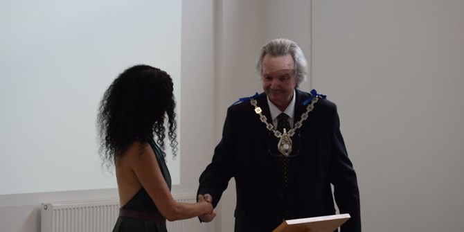 Jasmin Vardimon MBE and Mayor of Ashford Cllr Larry Krause shaking hands