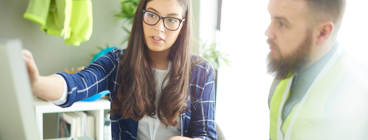 Apprentice being shown plans