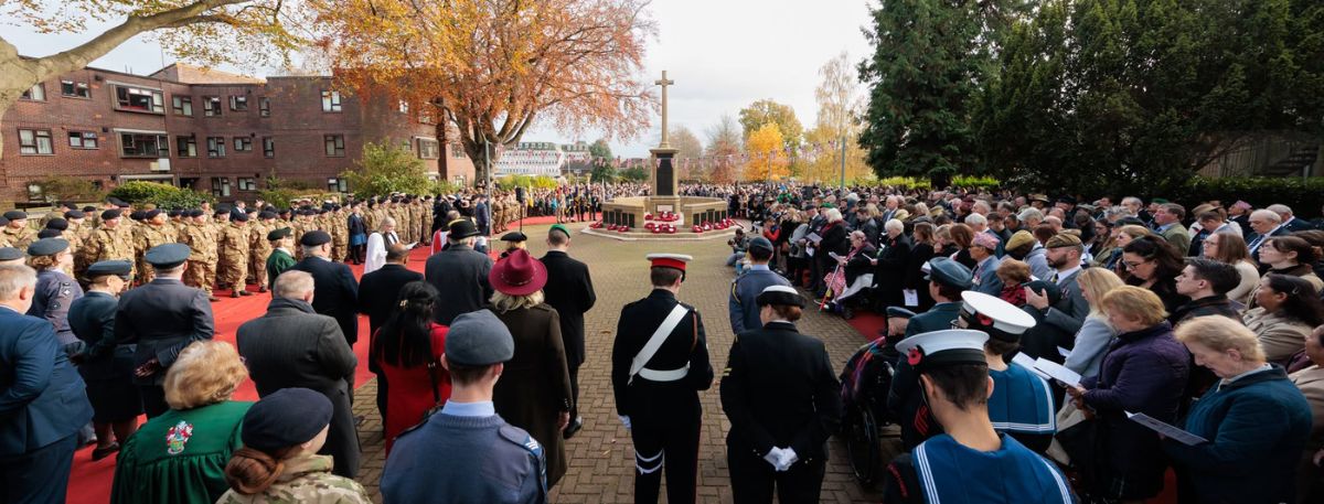 People paying respects during Ashford's Remembrance event in 2025