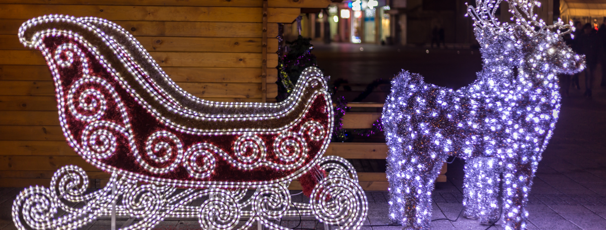 Lighted display of a sleigh and reindeer