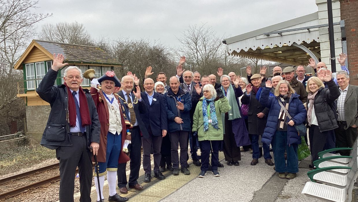 Marshlink anniversary group by the platform at Rye Station