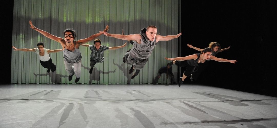 Six Jasmin Vardimon Company members during a performance