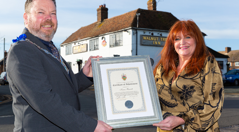 Walnut Tree licensee Karen Barrett receives Mayor's Certificate of Achievement award in Aldington