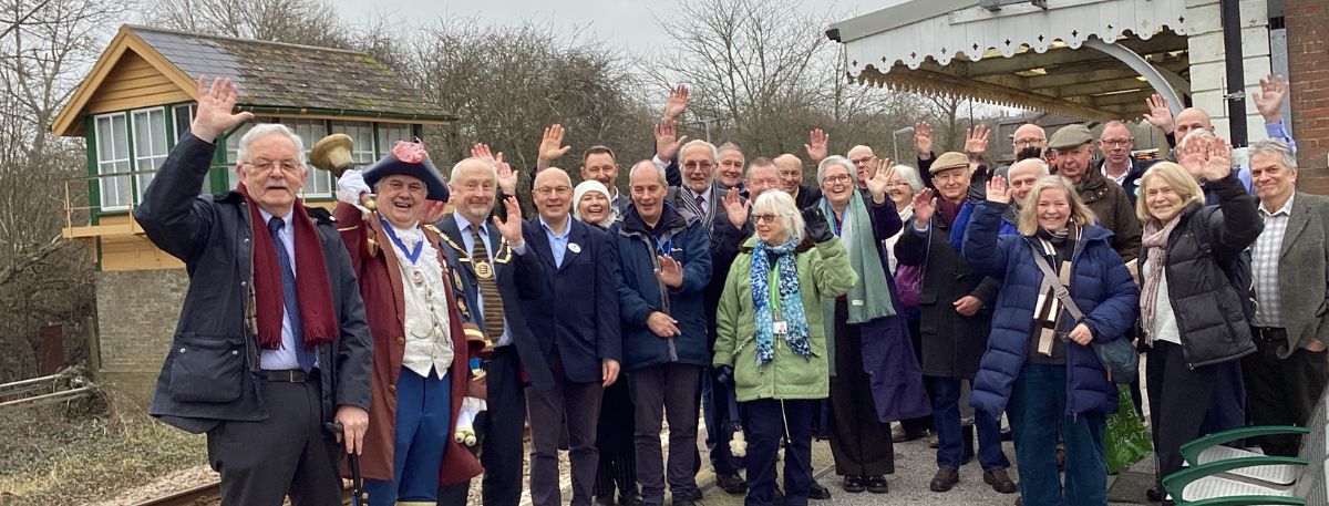 Marshlink anniversary group by the platform at Rye Station