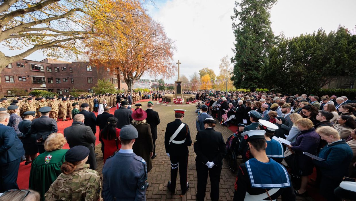 People paying respects during Ashford's Remembrance event in 2025 tile