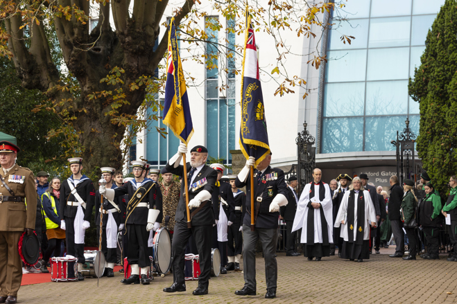 The Royal British Legion Standard Bearers entering Memorial Gardens